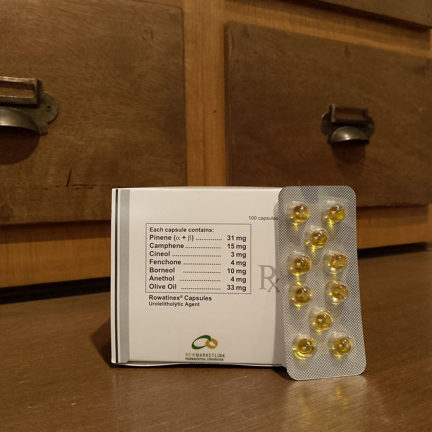 Pinene, Camphene, Cineol, Fenchone, Bomeol, Anethol and Olive Oil (Rowatinex) Capsule